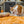 Load image into Gallery viewer, P.L.A.Y. Feline Frenzy Halloween Kicker Toy - Meow-my string unraveled and being bitten by ginger kitty
