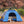 Load image into Gallery viewer, Scout &amp; About Landscape Series Outdoor Dog Tent by P.L.A.Y. - dog laying in tent in Snow Canyon Park in Utah
