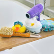 Load image into Gallery viewer, P.L.A.Y. Splish Splash Collection - five bath-themed toys on rustic tray over white bathtub