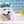 Load image into Gallery viewer, P.L.A.Y. Splish Splash Collection - Shower cap toy on fluffy white dog in bathtime with tounge out happy
