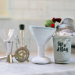 Load image into Gallery viewer, P.L.A.Y. Barktender Collection - Dogtail Shaker Toy next to Pawtini toy on the counter with cocktail making accessories