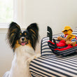 Load image into Gallery viewer, P.L.A.Y. Totally Touristy Giuseppe’s Gondola - both sizes sitting on a blue and white striped chair with little fluffy pup smiling next to them