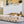 Load image into Gallery viewer, Dog sleeping on Marina Boxy Bed in Sand solid side showing
