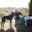 Load image into Gallery viewer, Scout & About Outdoor Chill Pad in Mocha and Vanilla on hiking backpacks with human and dog in the woods