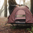 Load image into Gallery viewer, Scout & About Outdoor Dog Tent by P.L.A.Y. - human placing tent on the ground