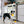 Load image into Gallery viewer, P.L.A.Y. x Earth Rated Montreal Munchies Collection - Poochtine Toy with one French Fry in dog&#39;s mouth
