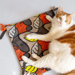 Load image into Gallery viewer, P.L.A.Y. Feline Frenzy Purrfect Playtime Mat - ginger cat sitting on top of the mat staring into the camera
