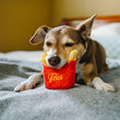 Load image into Gallery viewer, P.L.A.Y. American Classic Frenchie Fries Toy - dog resting head on fries while laying on a bed
