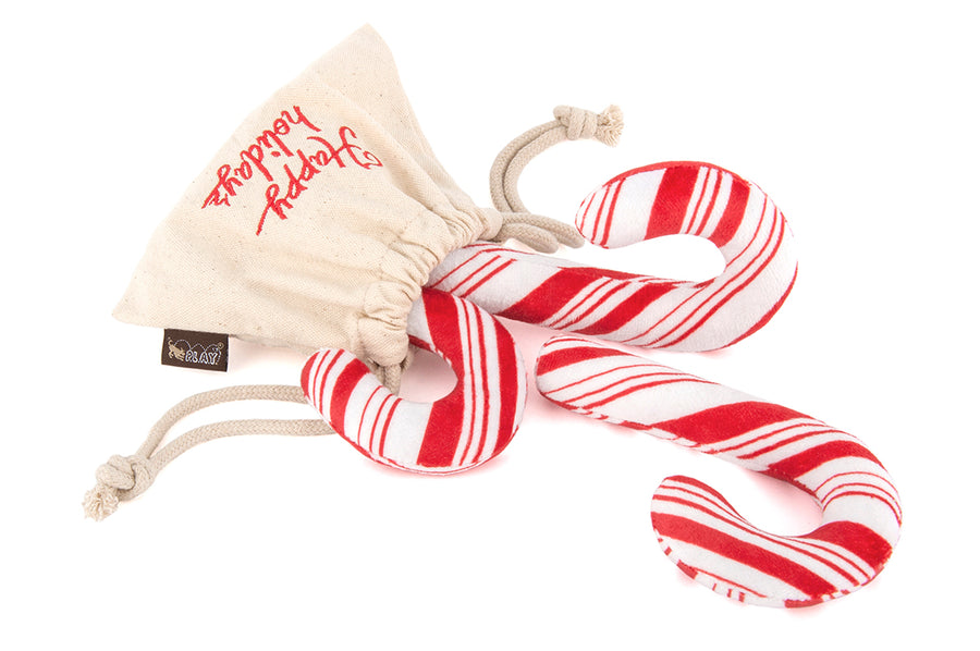 Holiday Classic Collection by P.L.A.Y. - Cheerful Candy Canes Toy with three candy canes coming out of canvas drawstring bag