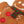 Load image into Gallery viewer, Holiday Classic Collection by P.L.A.Y. - Holly Jolly Gingerbread Man Toy close up of details for scarf and buttons
