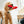 Load image into Gallery viewer, P.L.A.Y. Puppy Love Collection - Fur-ever Hearts Toy in mouth of dog with dog mom smiling on
