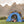 Load image into Gallery viewer, Scout &amp; About Landscape Series Outdoor Dog Tent by P.L.A.Y. -  dog sitting up with Camp Corbin Pack Leader Lantern Toy in River tent with snowcapped mountains behind it
