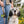 Load image into Gallery viewer, Proper Pup Poop Bag Dispensers from P.L.A.Y. - Denim on Napoli Leash with human and white dog in the middle of a flower field
