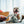 Load image into Gallery viewer, P.L.A.Y. Big Five of Africa Collection - Elephant Toy underneath a paw in a living room with smiling pit bull behind
