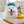 Load image into Gallery viewer, P.L.A.Y. Splish Splash Collecton - Shower Quack Toy with white fluffy dog wearing shower cap in tub with duckie toy on the bath board draped across the top
