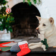 Load image into Gallery viewer, P.L.A.Y. Merry Woofmas Good Dog Stocking - black and white dog laying on Chill Pad with bone toy in mouth
