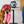 Load image into Gallery viewer, P.L.A.Y. 80s Classic Paw Talk Toy - cord in dog&#39;s mouth with phone dangling
