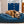 Load image into Gallery viewer, P.L.A.Y. Manhattan Lounge Bed Collection - The Chelsea with shaggy dog sleeping in it next to couch
