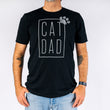 Load image into Gallery viewer, P.L.A.Y. Cat Dad Humanitee - T-Shirt modeled on man
