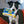 Load image into Gallery viewer, P.L.A.Y. 90s Classics Collection - Woofbuster Video Toy in black and white dog&#39;s mouth staring into the camera
