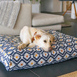 Load image into Gallery viewer, Marina Boxy Bed in Cobalt Blue with dog laying on print side
