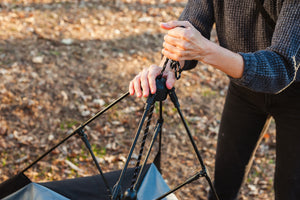 Scout & About Landscape Series Outdoor Dog Tent by P.L.A.Y. - human setting-up tent