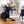 Load image into Gallery viewer, P.L.A.Y. Garden Fresh Collection - Zucchini Toy lifestyle image with small and large black dog in dining room posing with each toy
