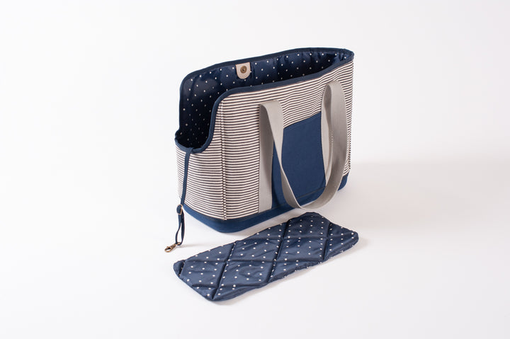 LeftPine x P.L.A.Y. Navy Striped Dog Carrier with interior pad removed and built-in leash showing