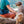 Load image into Gallery viewer, P.L.A.Y.&#39;s Explorer Pack in Waterfall Blue being worn on human sitting on log with dog
